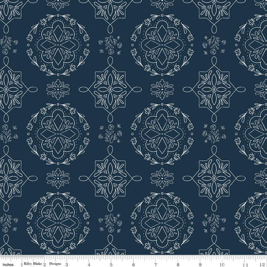 Image of Homage Doilies Oxford Blue quilting cotton fabric by Fran Gulick for Riley Blake Designs. Features printed lace on a dark blue background. Cute Little Fabric Shop.