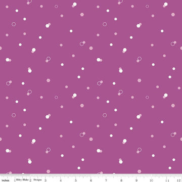Image of Homage Hexi Fuchsia quilting cotton fabric by Fran Gulick for Riley Blake Designs. Features hexagons on a purple background. Cute Little Fabric Shop.