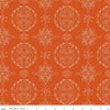 Image of Homage Doilies Pumpkin quilting cotton fabric by Fran Gulick for Riley Blake Designs. Features printed lace on an orange background. Cute Little Fabric Shop.