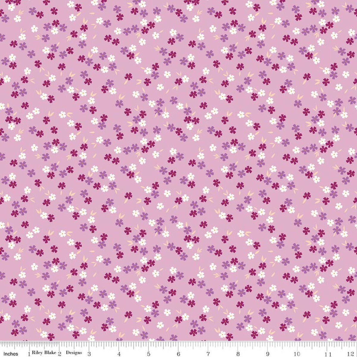 Image of Homage Ditsy Floral Lavender quilting cotton fabric by Fran Gulick for Riley Blake Designs. Features flowers on a purple background. Cute Little Fabric Shop.