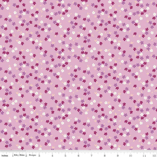 Image of Homage Ditsy Floral Lavender quilting cotton fabric by Fran Gulick for Riley Blake Designs. Features flowers on a purple background. Cute Little Fabric Shop.