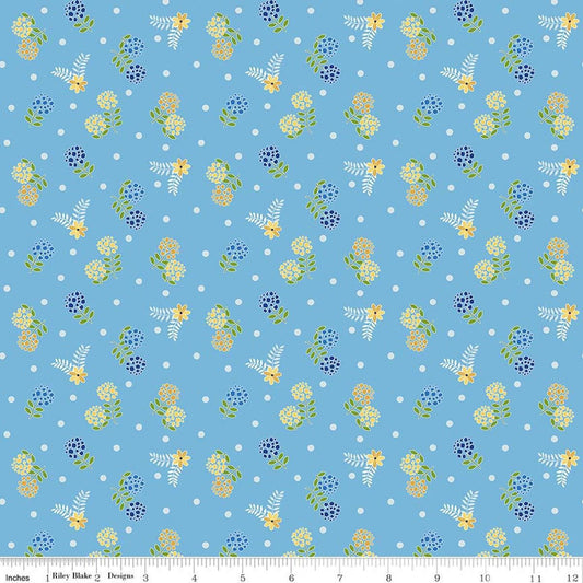Image of Awakening Blossoms Blue quilting cotton fabric by Cherry Guidry for Riley Blake Designs. Features flowers on a blue background. Cute Little Fabric Shop.