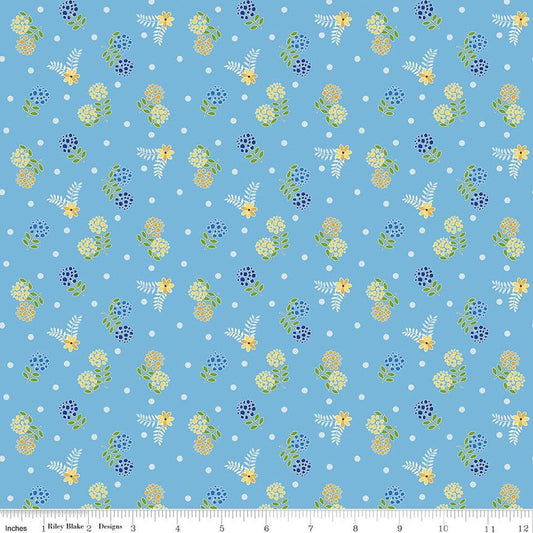 Image of Awakening Blossoms Blue quilting cotton fabric by Cherry Guidry for Riley Blake Designs. Features flowers on a blue background. Cute Little Fabric Shop.