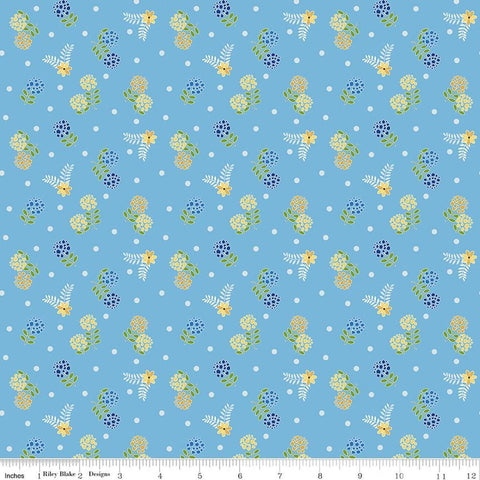 Image of Awakening Blossoms Blue quilting cotton fabric by Cherry Guidry for Riley Blake Designs. Features flowers on a blue background. Cute Little Fabric Shop.