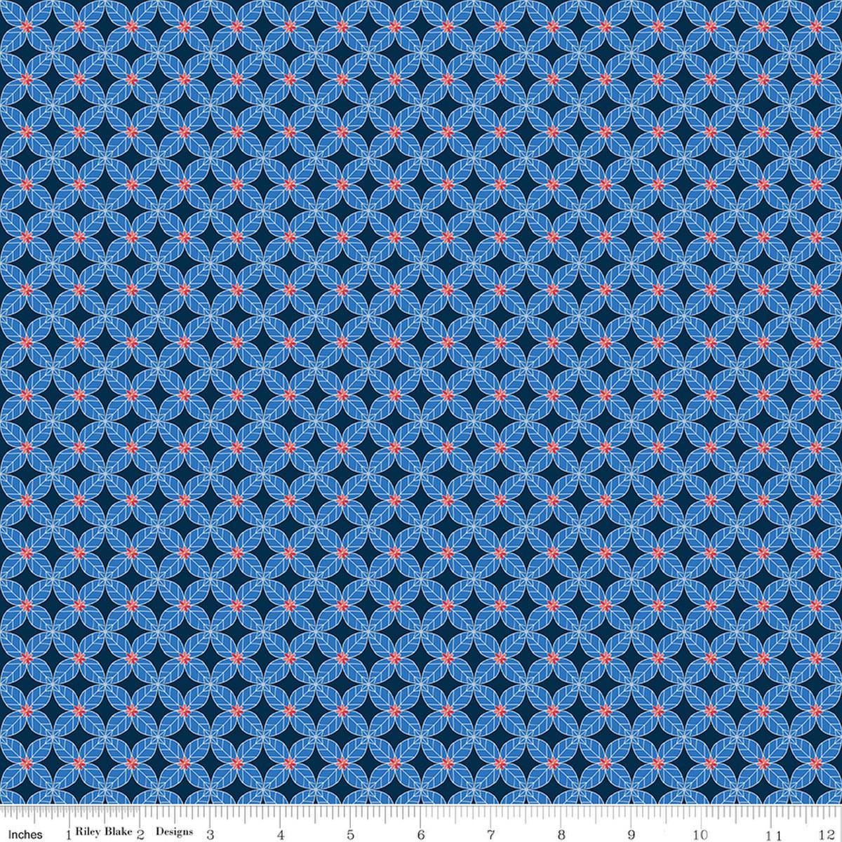 Image of Awakening Petals Blue quilting cotton fabric by Cherry Guidry for Riley Blake Designs. Features a geometric pattern on a blue background. Cute Little Fabric Shop.