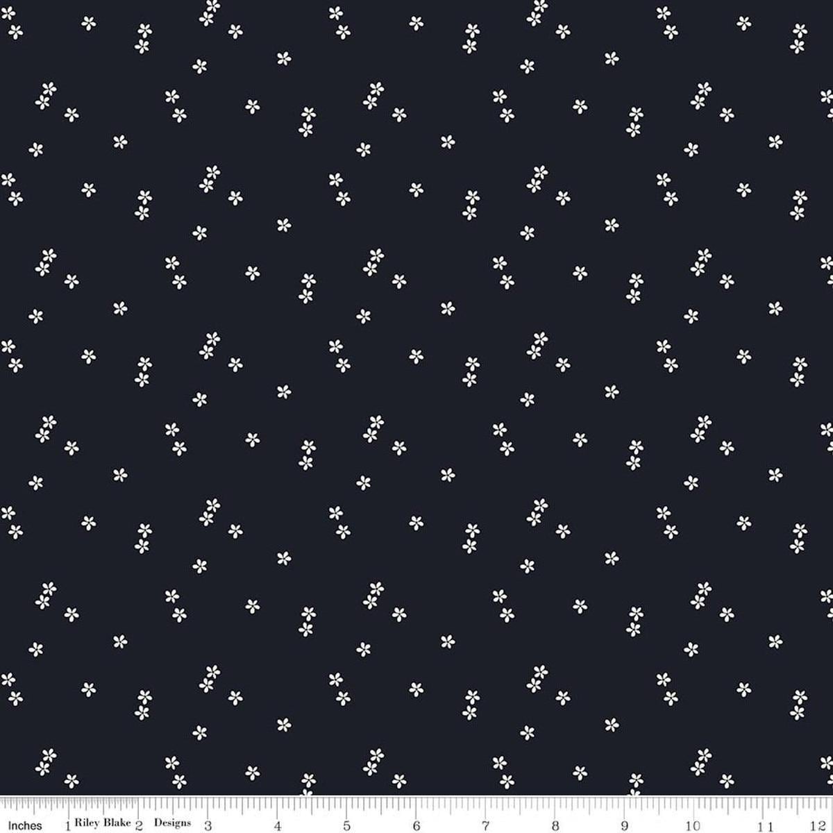 Image of Blue Blooms and Threads Ditzy Navy quilting cotton fabric by Christopher Thompson for Riley Blake Designs. Features flowers on a blue background. Cute Little Fabric Shop.