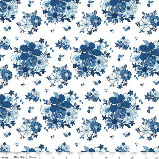 Image of Blue Blooms and Threads Main White quilting cotton fabric by Christopher Thompson for Riley Blake Designs. Features flowers on a white background. Cute Little Fabric Shop.