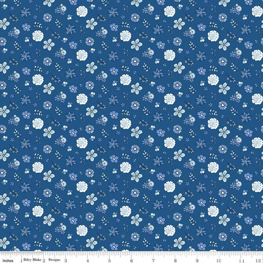 Image of Blue Blooms and Threads Floral Denim quilting cotton fabric by Christopher Thompson for Riley Blake Designs. Features flowers on a blue background. Cute Little Fabric Shop.