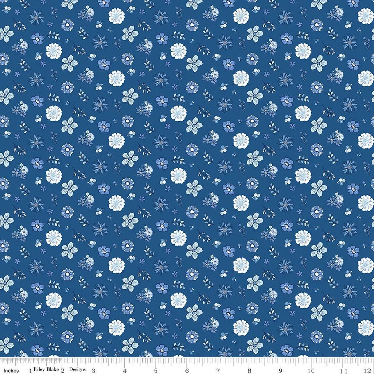Image of Blue Blooms and Threads Floral Denim quilting cotton fabric by Christopher Thompson for Riley Blake Designs. Features flowers on a blue background. Cute Little Fabric Shop.