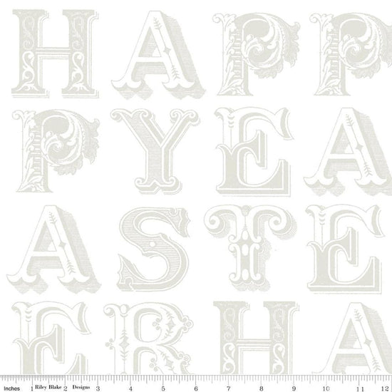 Image of Egg Hunt Happy Easter Blender White quilting cotton fabric by J. Wecker Frisch for Riley Blake Designs. Features words on a white background. Cute Little Fabric Shop.