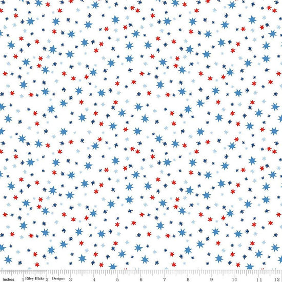 Image of Firecracker Stars White quilting cotton fabric by My Mind's Eye for Riley Blake Designs. Features stars on a white background. Cute Little Fabric Shop.