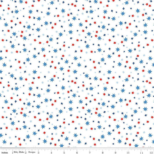 Image of Firecracker Stars White quilting cotton fabric by My Mind's Eye for Riley Blake Designs. Features stars on a white background. Cute Little Fabric Shop.