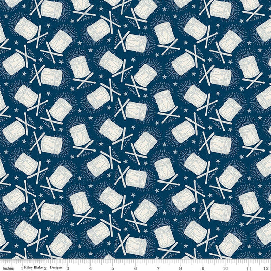Image of Independence Drums Oxford quilting cotton fabric by The RBD Designers for Riley Blake Designs. Features drums on a blue background. Cute Little Fabric Shop.