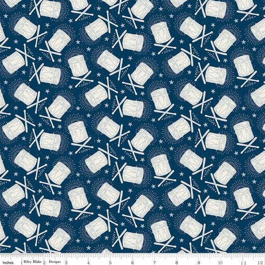 Image of Independence Drums Oxford quilting cotton fabric by The RBD Designers for Riley Blake Designs. Features drums on a blue background. Cute Little Fabric Shop.