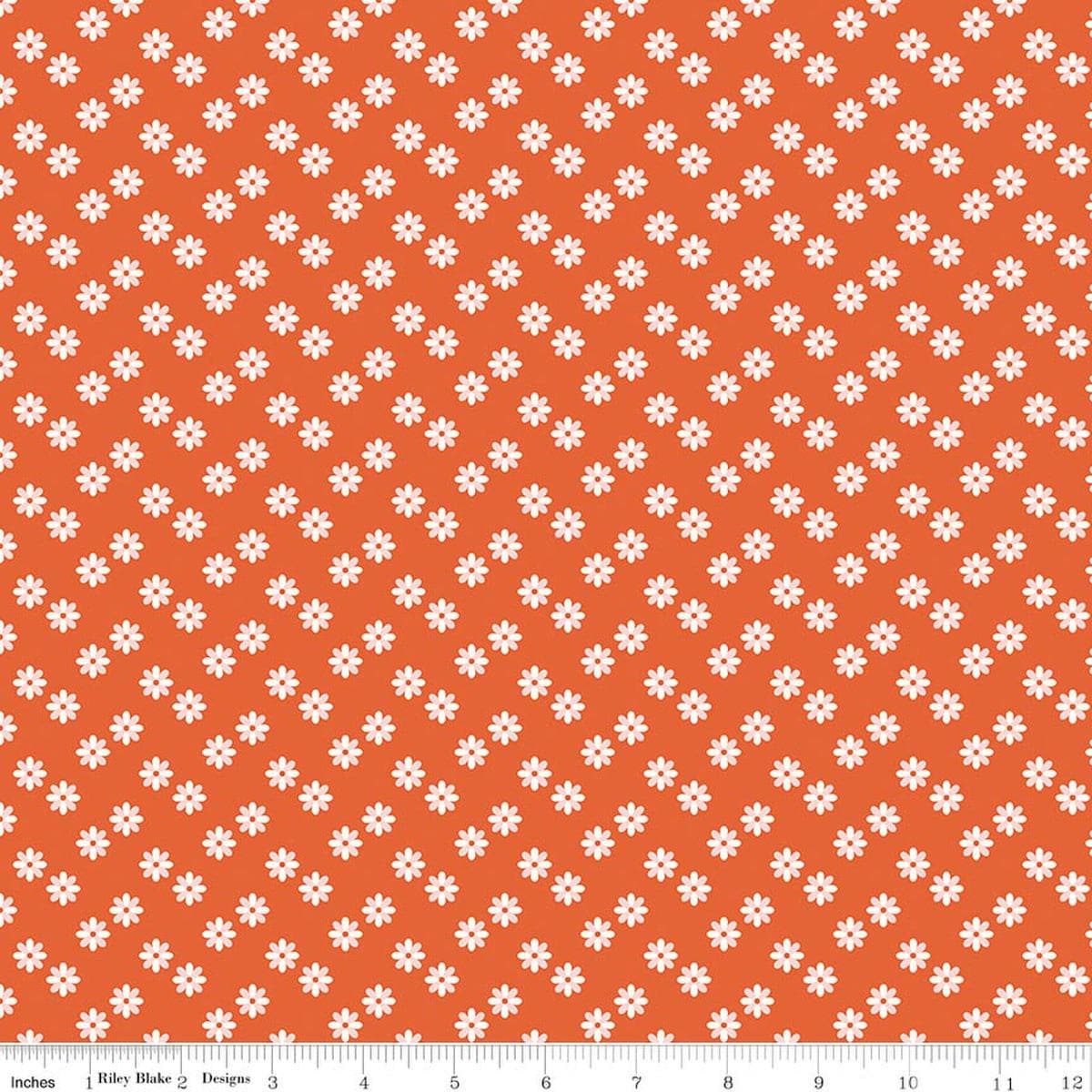 Image of Meadow Moments Flower Sprinkle Geranium quilting cotton pattern by Little Forest Atelier for Riley Blake Designs. Features flowers on an orange background. Cute Little Fabric Shop.