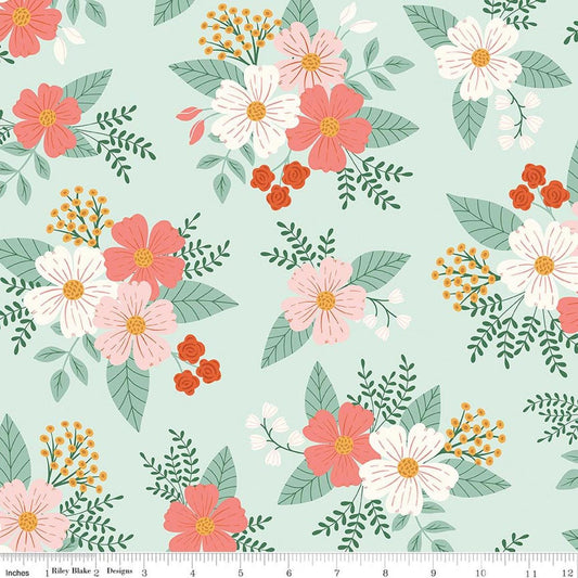 Image of Meadow Moments Main Mint quilting cotton pattern by Little Forest Atelier for Riley Blake Designs. Features flowers on a green background. Cute Little Fabric Shop.