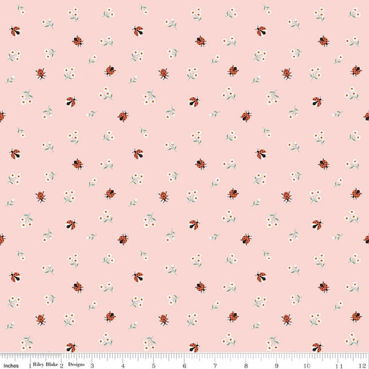 Image of Meadow Moments Ladybugs Pink quilting cotton pattern by Little Forest Atelier for Riley Blake Designs. Features flowers on a pink background. Cute Little Fabric Shop.