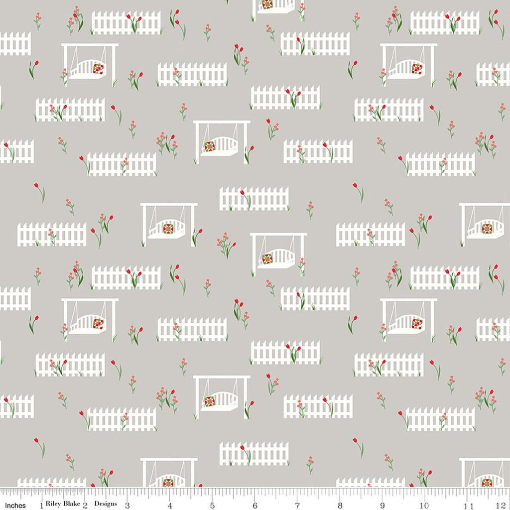 Image of Front Porch Porch Swings Gray quilting cotton fabric by Jill Finley for Riley Blake Designs. Features garden fences on a gray background. Cute Little Fabric Shop.