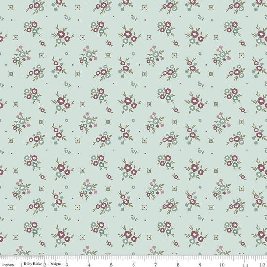 Image of Renew Floral Bleached Denim quilting cotton fabric by Sandy Gervais for Riley Blake Designs. Features flowers on a blue background. Cute Little Fabric Shop.