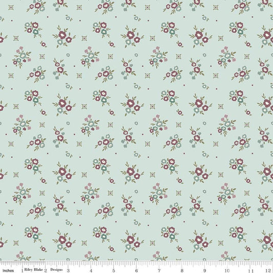 Image of Renew Floral Bleached Denim quilting cotton fabric by Sandy Gervais for Riley Blake Designs. Features flowers on a blue background. Cute Little Fabric Shop.