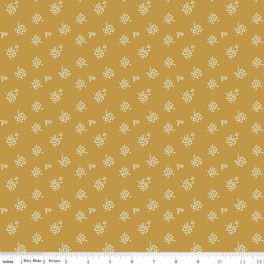 Image of Renew Ditsy Gold quilting cotton fabric by Sandy Gervais for Riley Blake Designs. Features flowers on a yellow background. Cute Little Fabric Shop.