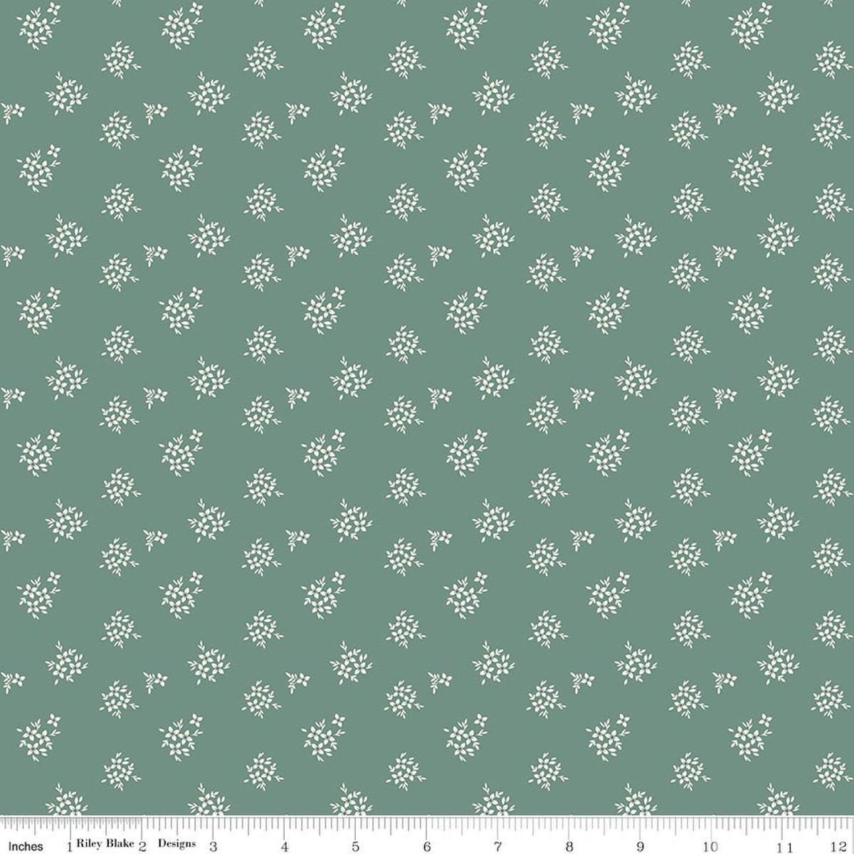 Image of Renew Ditsy Aqua quilting cotton fabric by Sandy Gervais for Riley Blake Designs. Features flowers on a blue background. Cute Little Fabric Shop.