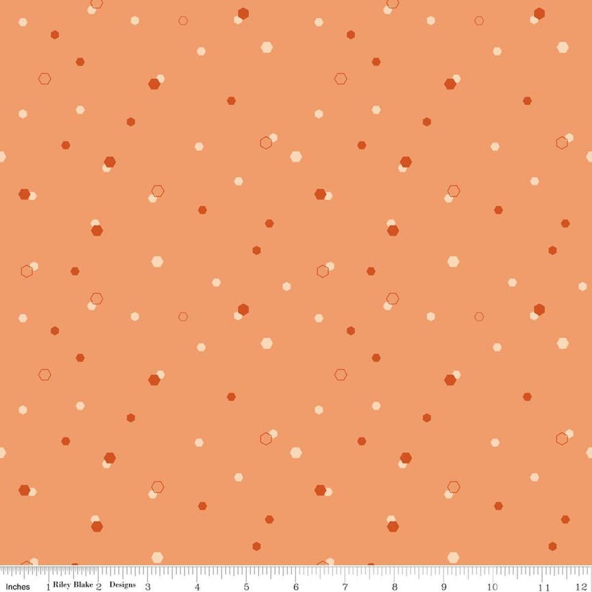 Image of Homage Hexi Marmalade quilting cotton fabric by Fran Gulick for Riley Blake Designs. Features hexagons on an orange background. Cute Little Fabric Shop.