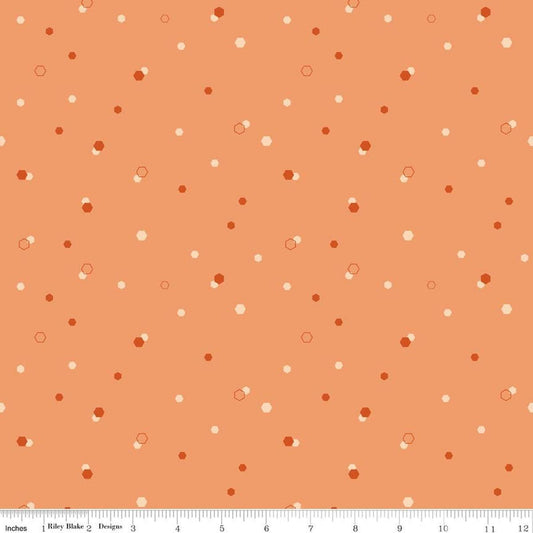 Image of Homage Hexi Marmalade quilting cotton fabric by Fran Gulick for Riley Blake Designs. Features hexagons on an orange background. Cute Little Fabric Shop.