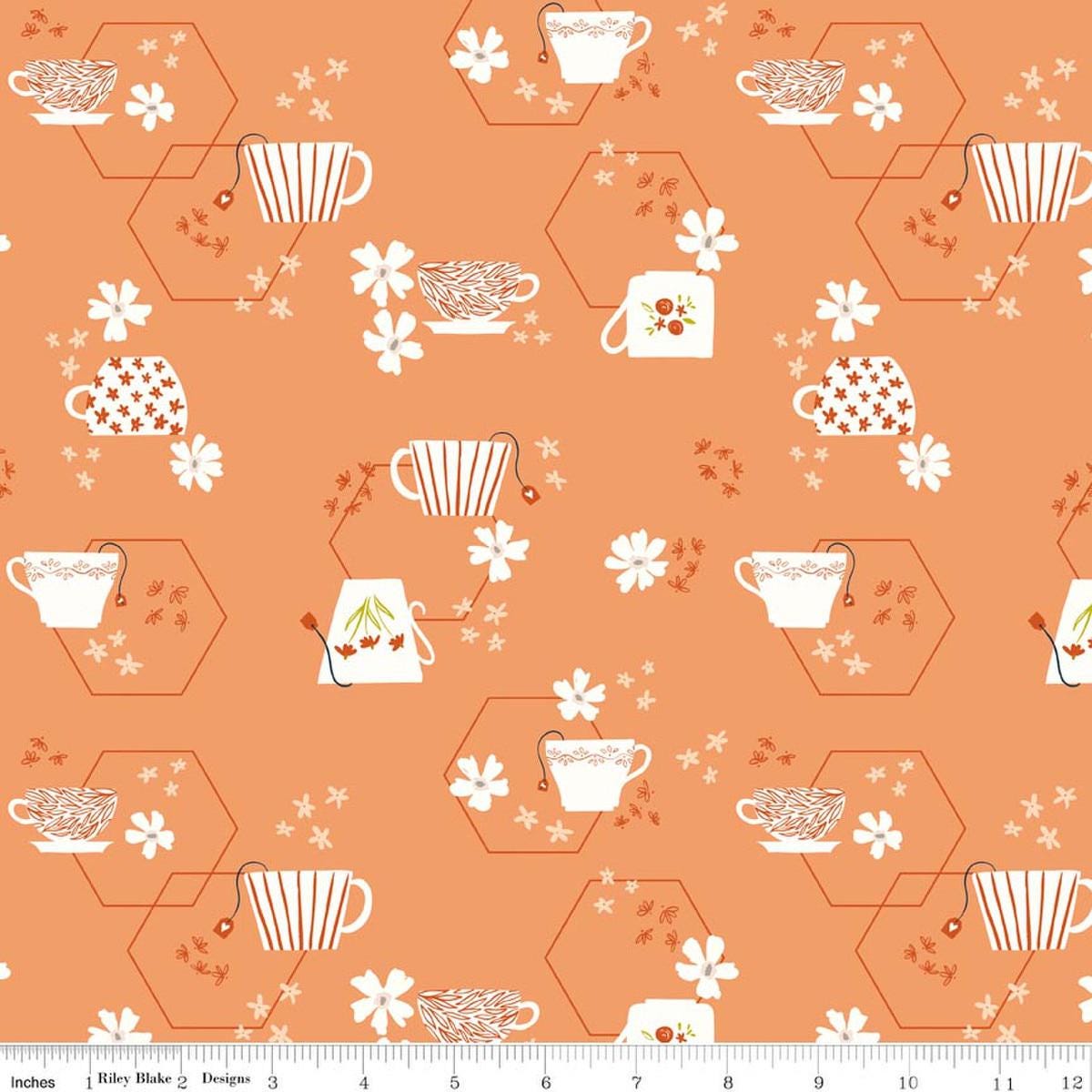 Image of Homage Tea Time Marmalade quilting cotton fabric by Fran Gulick for Riley Blake Designs. Features teacups on an orange background. Cute Little Fabric Shop.