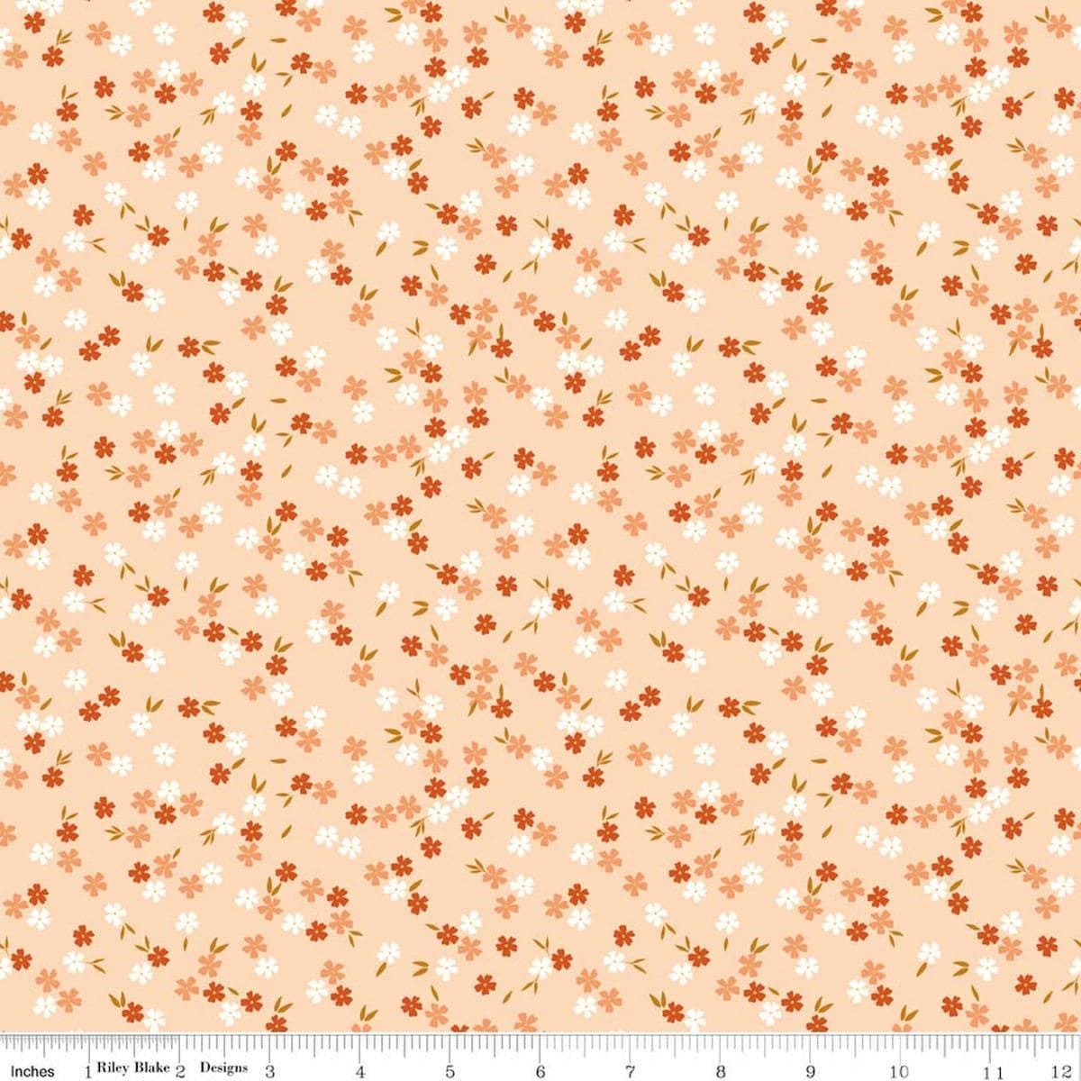 Image of Homage Ditsy Floral Shell quilting cotton fabric by Fran Gulick for Riley Blake Designs. Features flowers on an orange background. Cute Little Fabric Shop.