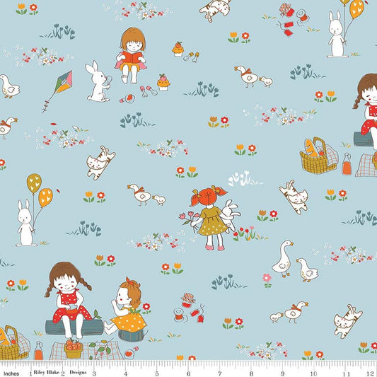 Image of Serendipity 2 Main Powder quilting cotton fabric by Minki Kim for Riley Blake Designs. Features a picnic scene on a blue background. Cute Little Fabric Shop.