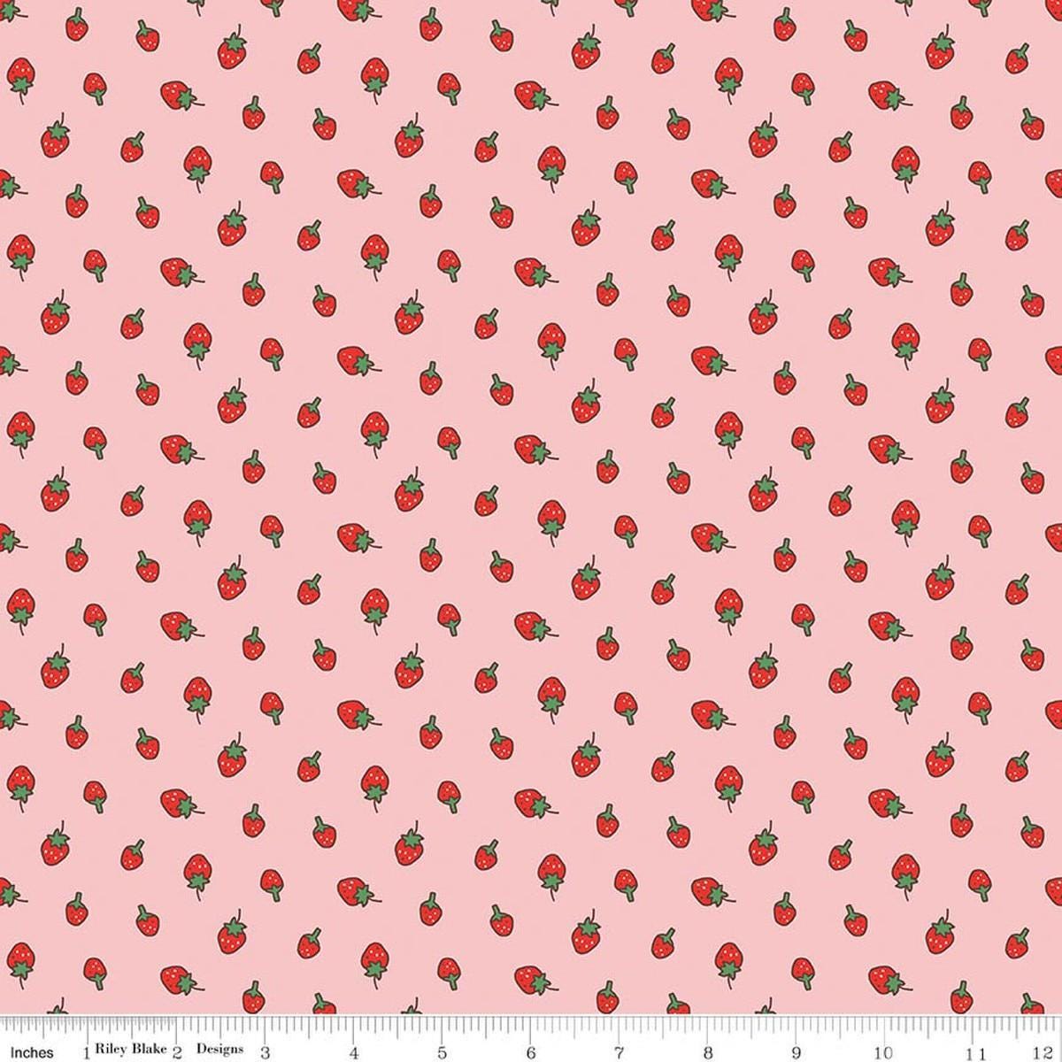 Image of Serendipity 2 Strawberries Pink quilting cotton fabric by Minki Kim for Riley Blake Designs. Features strawberries on a pink background. Cute Little Fabric Shop.