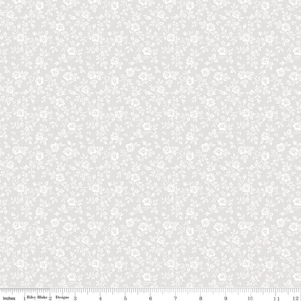 Image of Elegant Essentials Small Flower White quilting cotton fabric by Jennifer Bosworth for Riley Blake Designs. Features flowers on a white background. Cute Little Fabric Shop.