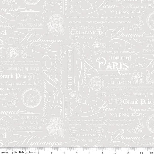 Image of Elegant Essentials Text White quilting cotton fabric by Jennifer Bosworth for Riley Blake Designs. Features text on a white background. Cute Little Fabric Shop.
