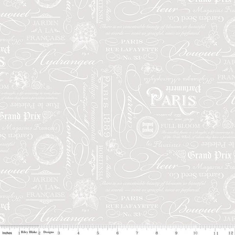 Image of Elegant Essentials Text White quilting cotton fabric by Jennifer Bosworth for Riley Blake Designs. Features text on a white background. Cute Little Fabric Shop.