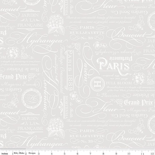 Image of Elegant Essentials Text White quilting cotton fabric by Jennifer Bosworth for Riley Blake Designs. Features text on a white background. Cute Little Fabric Shop.