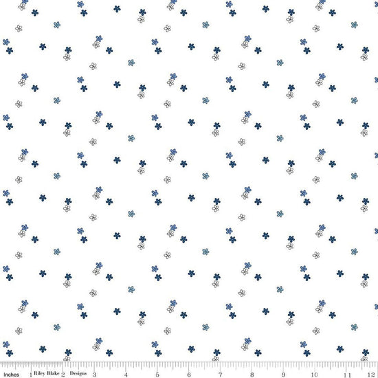 Image of Blue Blooms and Threads Ditzy White quilting cotton fabric by Christopher Thompson for Riley Blake Designs. Features flowers on a white background. Cute Little Fabric Shop.