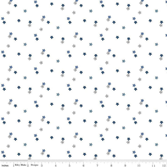 Image of Blue Blooms and Threads Ditzy White quilting cotton fabric by Christopher Thompson for Riley Blake Designs. Features flowers on a white background. Cute Little Fabric Shop.