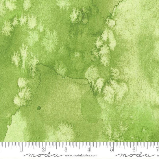 Image of Flow Basics Lime quilting cotton fabric by Create Joy Project for Moda Fabrics. Features abstract watercolor on a green background. Cute Little Fabric Shop.