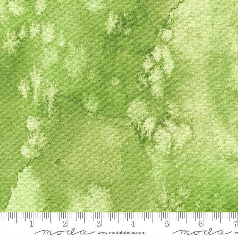Image of Flow Basics Lime quilting cotton fabric by Create Joy Project for Moda Fabrics. Features abstract watercolor on a green background. Cute Little Fabric Shop.