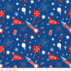 Image of Firecracker Main Blue quilting cotton fabric by My Mind's Eye for Riley Blake Designs. Features stars, rockets, and fireworks on a blue background. Cute Little Fabric Shop.