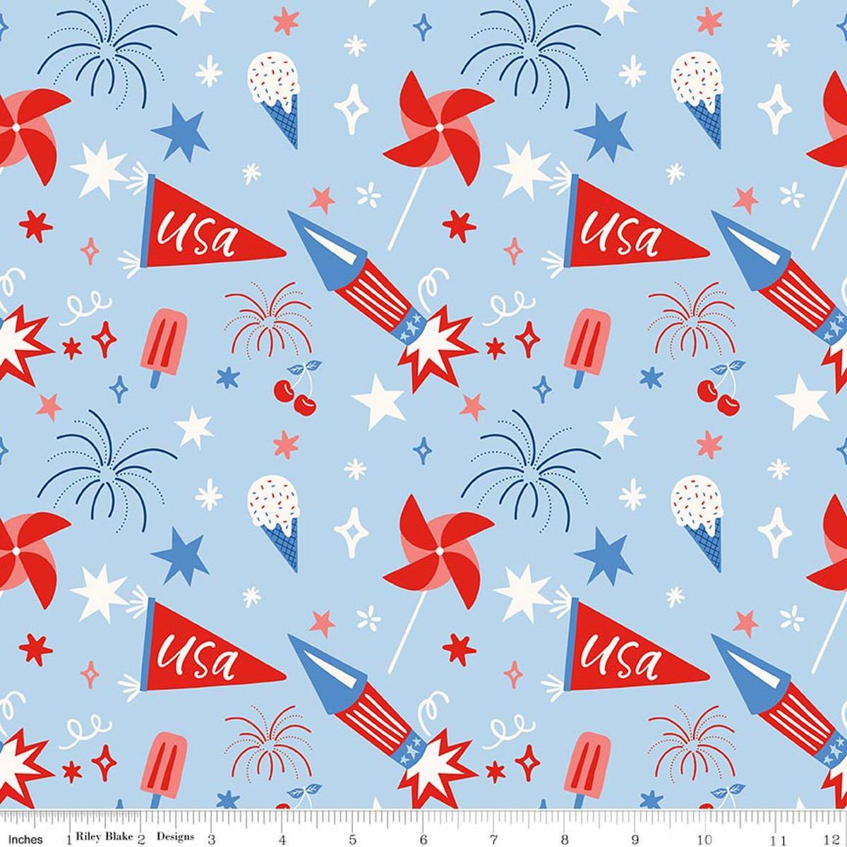 Image of Firecracker Main Frost quilting cotton fabric by My Mind's Eye for Riley Blake Designs. Features stars, rockets, and fireworks on a blue background. Cute Little Fabric Shop.
