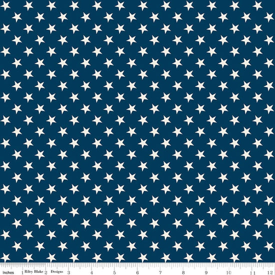 Image of Independence Stars Oxford quilting cotton fabric by The RBD Designers for Riley Blake Designs. Features stars on a blue background. Cute Little Fabric Shop.