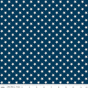 Image of Independence Stars Oxford quilting cotton fabric by The RBD Designers for Riley Blake Designs. Features stars on a blue background. Cute Little Fabric Shop.
