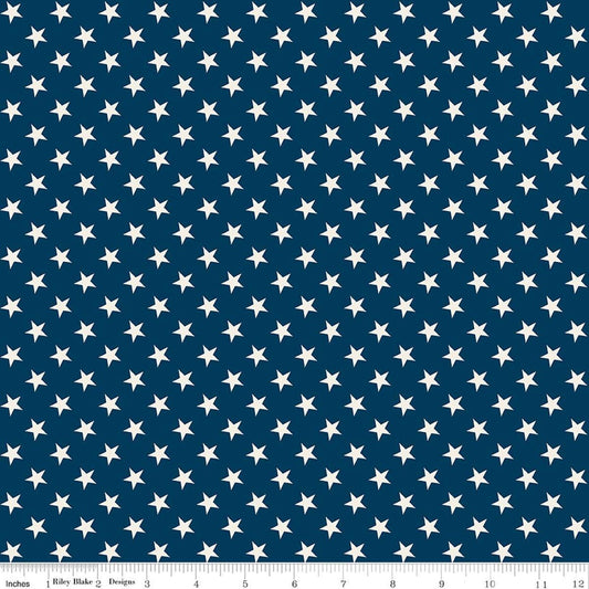 Image of Independence Stars Oxford quilting cotton fabric by The RBD Designers for Riley Blake Designs. Features stars on a blue background. Cute Little Fabric Shop.