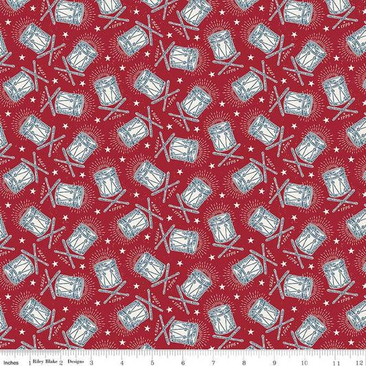 Image of Independence Drums Cherry Tart quilting cotton fabric by The RBD Designers for Riley Blake Designs. Features drums on a red background. Cute Little Fabric Shop.