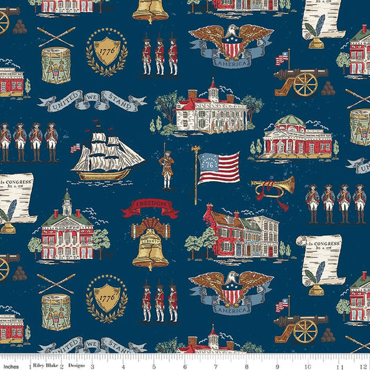 Image of Independence Main Oxford quilting cotton fabric by The RBD Designers for Riley Blake Designs. Features buildings on a blue background. Cute Little Fabric Shop.