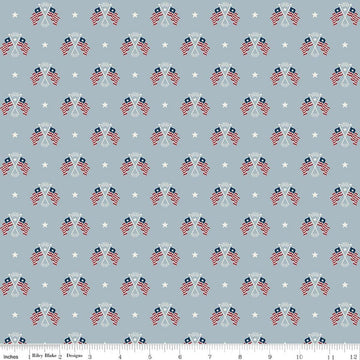 Image of Independence Old Glory Blue quilting cotton fabric by The RBD Designers for Riley Blake Designs. Features flags on a gray background. Cute Little Fabric Shop.