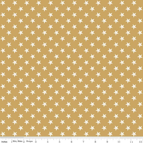 Image of Independence Stars Gold quilting cotton fabric by The RBD Designers for Riley Blake Designs. Features stars on a yellow background. Cute Little Fabric Shop.