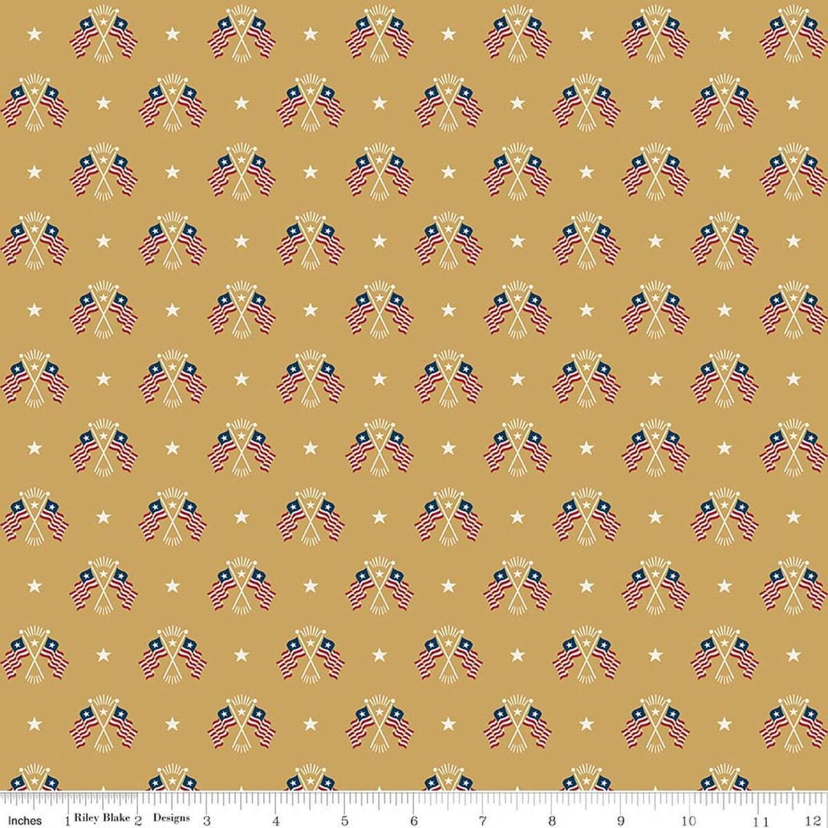 Image of Independence Old Glory Gold quilting cotton fabric by The RBD Designers for Riley Blake Designs. Features flags on a yellow background. Cute Little Fabric Shop.